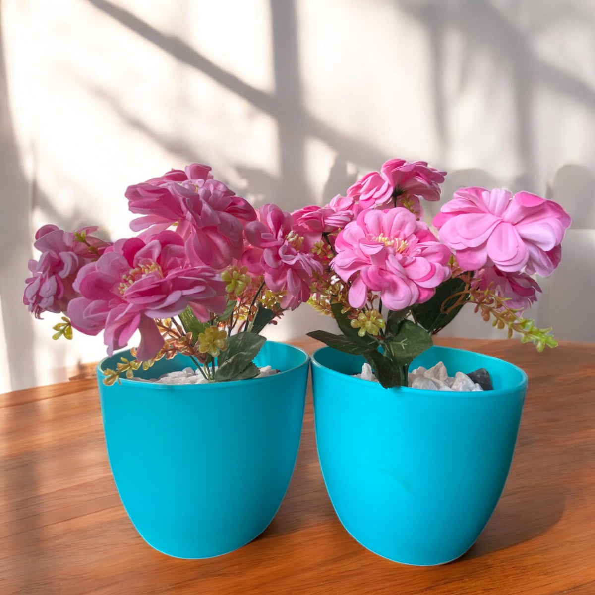 Pink Artificial Flower in Elegant Turquoise Plastic Pot by Pots O Crops