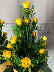 Elegant Yellow Flowers in Peach Planter Pot